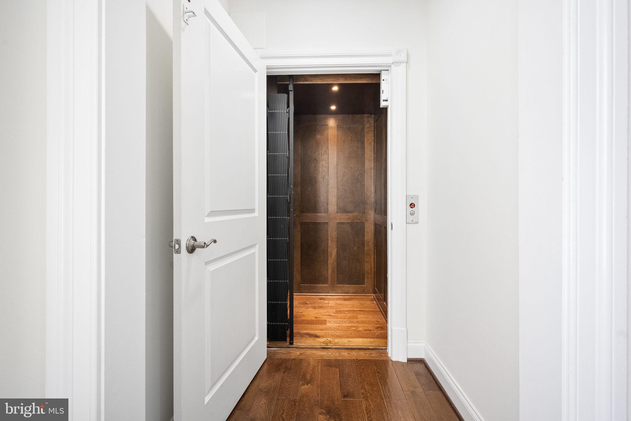 1411 Ridgeview Way Washington, DC 20007 - Photo 36 of 56 a view of a hallway with wooden floor