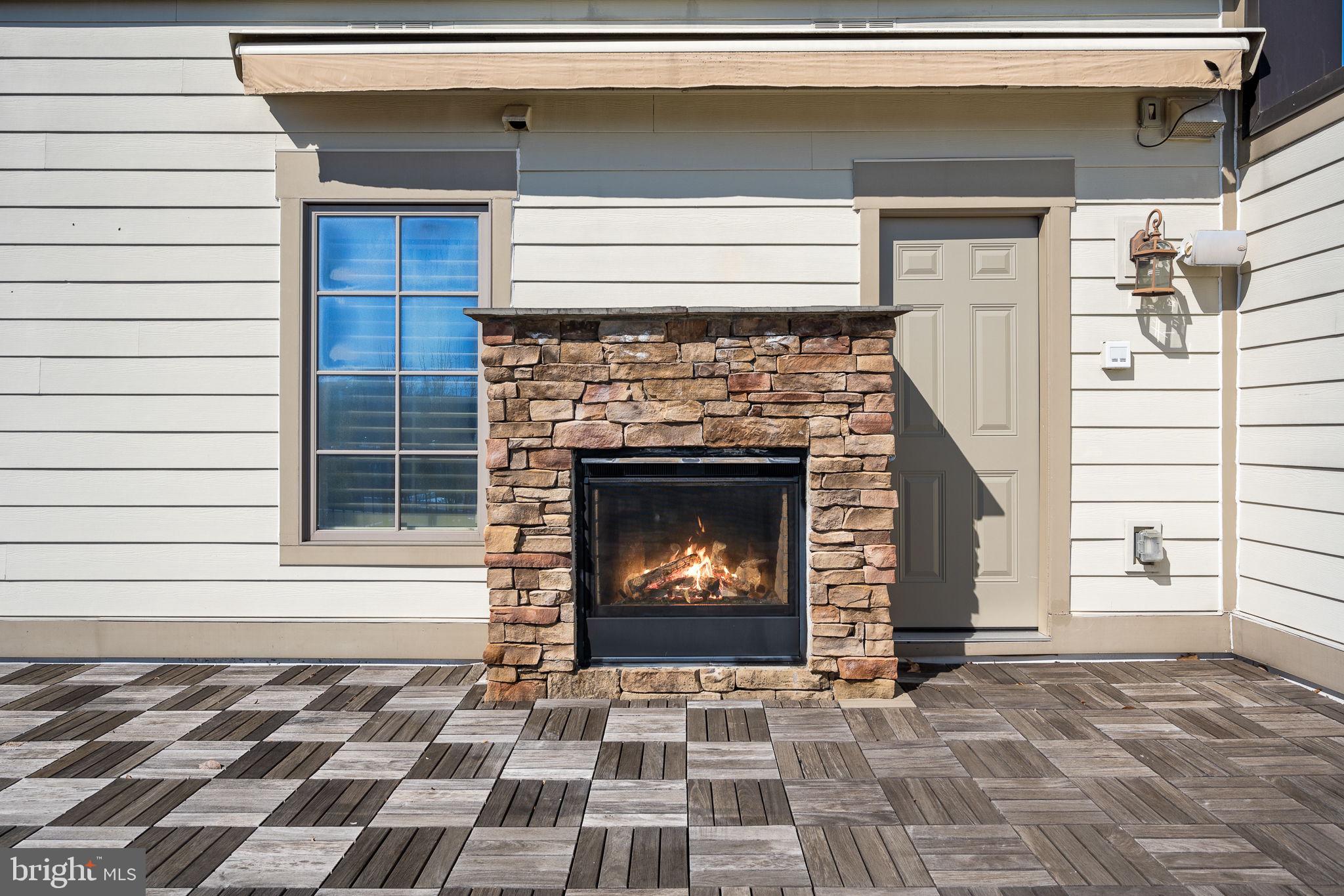 1411 Ridgeview Way Washington, DC 20007 - Photo 43 of 56 a view of a fireplace and window in the house