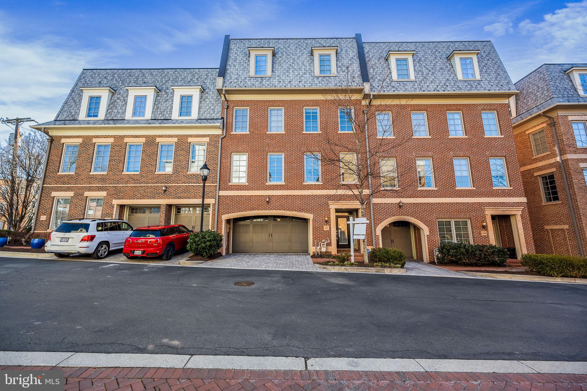 1411 Ridgeview Way Washington, DC 20007 - Photo 51 of 56 a front view of a building with lots of windows