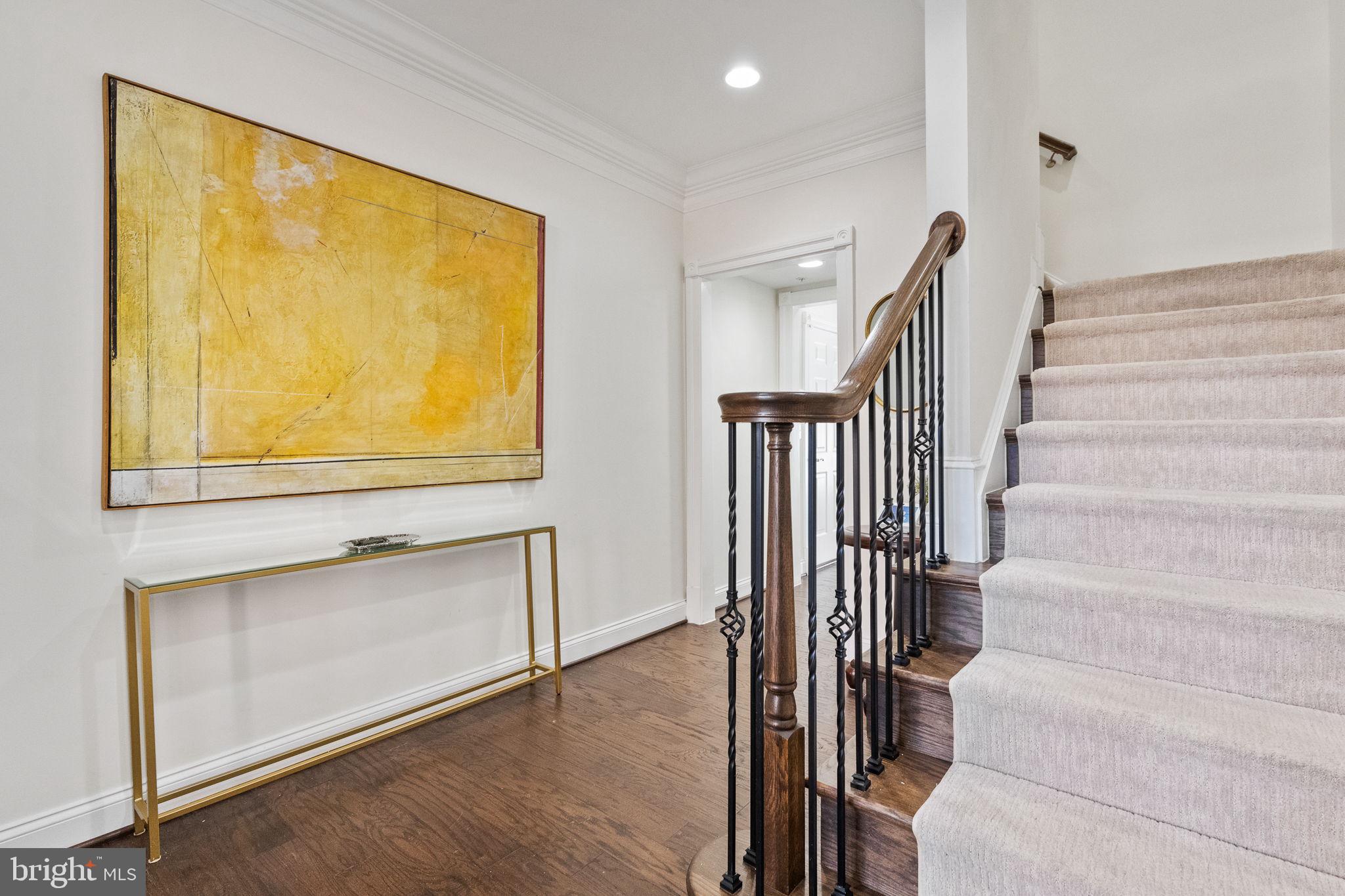 1411 Ridgeview Way Washington, DC 20007 - Photo 6 of 56 a view of a hallway with wooden floor and entryway