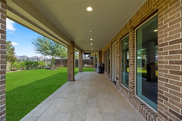 a view of a porch with a backyard