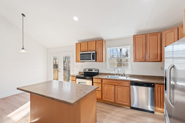 5805 Washer Road Lyles, TN 37098 - Photo 12 of 44 a kitchen with stainless steel appliances granite countertop a sink stove and refrigerator