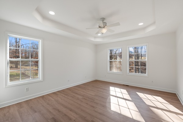 5805 Washer Road Lyles, TN 37098 - Photo 16 of 44 a view of an empty room with a window and wooden floor