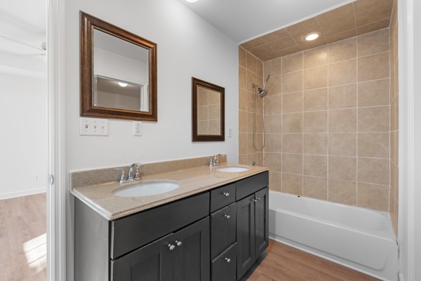 5805 Washer Road Lyles, TN 37098 - Photo 19 of 44 a bathroom with a sink vanity tub and a mirror