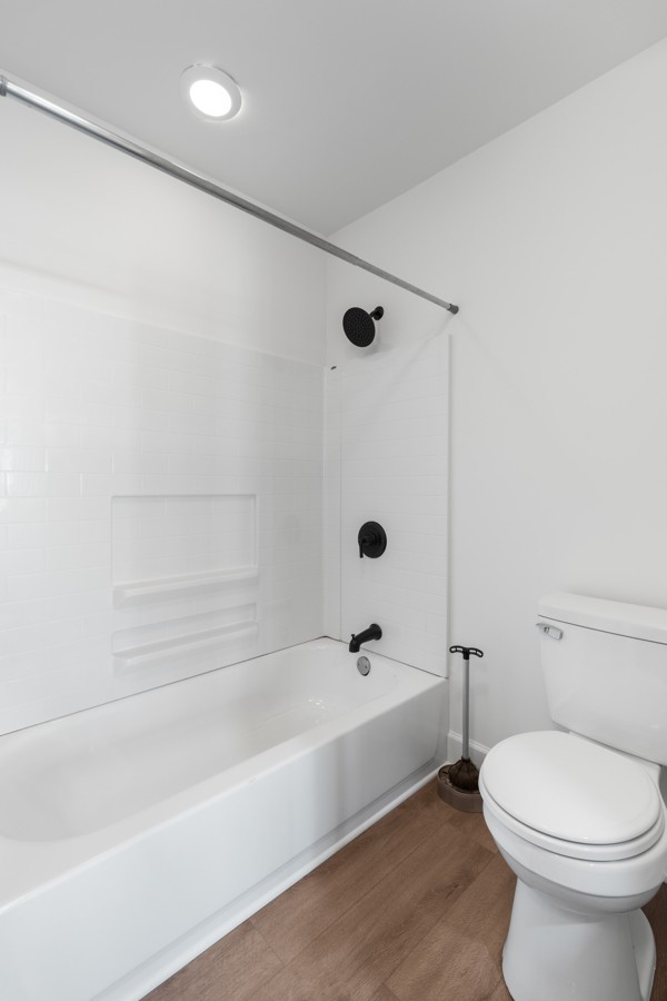 5805 Washer Road Lyles, TN 37098 - Photo 23 of 44 a bathroom with a toilet and a bathtub