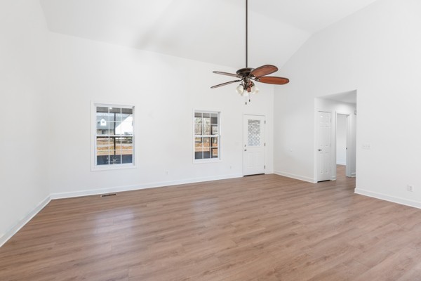 5805 Washer Road Lyles, TN 37098 - Photo 8 of 44 a view of an empty room with a window and wooden floor