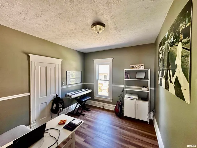 a room with furniture and a window