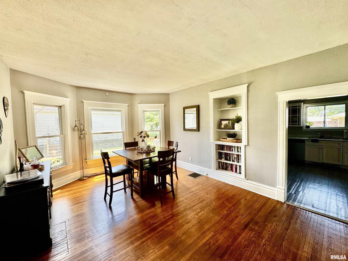 1215 13th Street Viola, IL 61486 - Photo 10 of 35 a view of a livingroom with furniture window and wooden floor