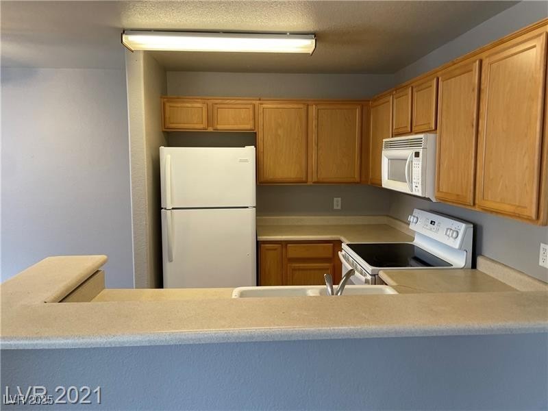 2964 Juniper Hills Boulevard, Unit 203 Las Vegas, NV 89142 - Photo 7 of 13