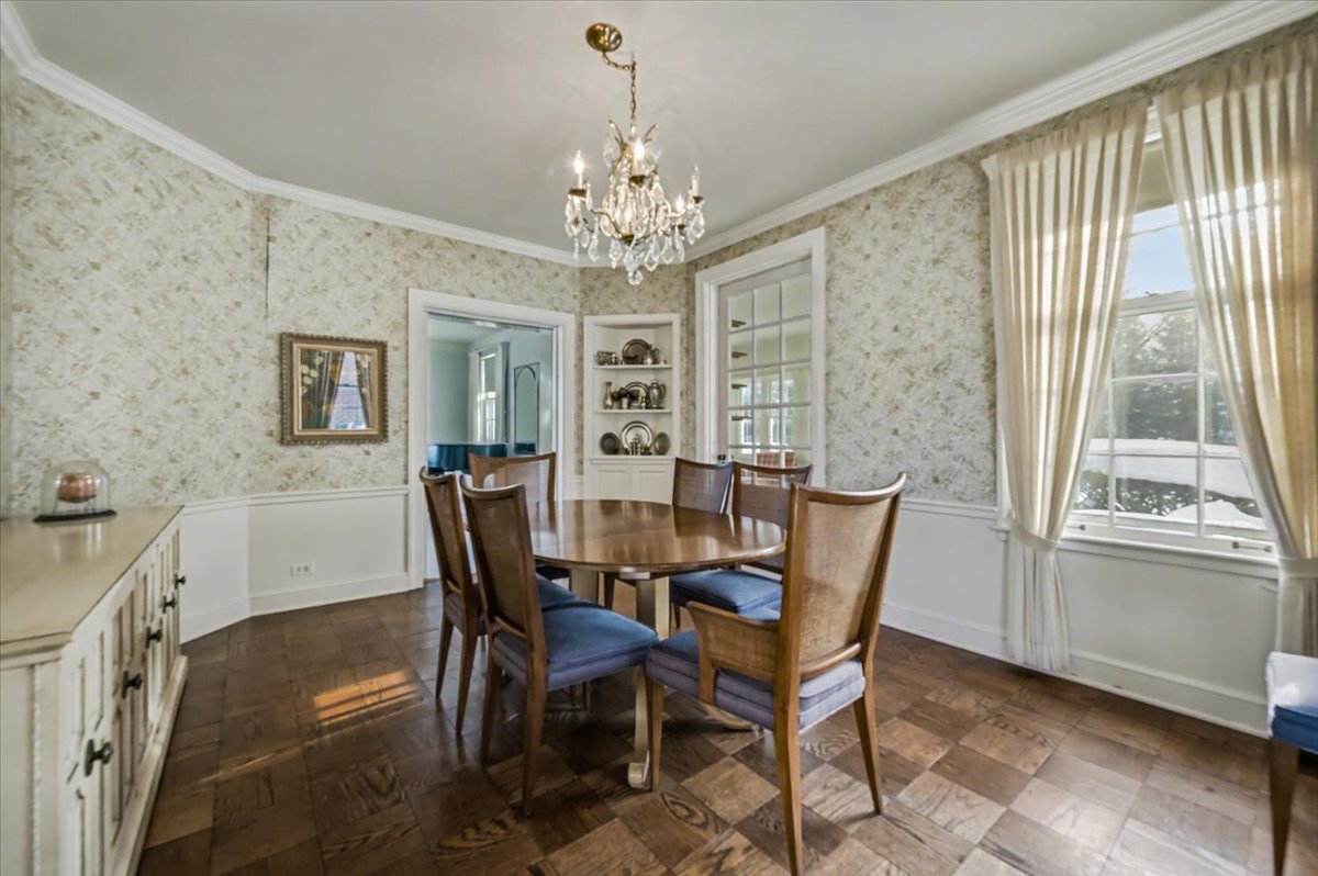 900 Sheridan Road Wilmette, IL 60091 - Photo 13 of 31 a view of a dining room with furniture window and outside view
