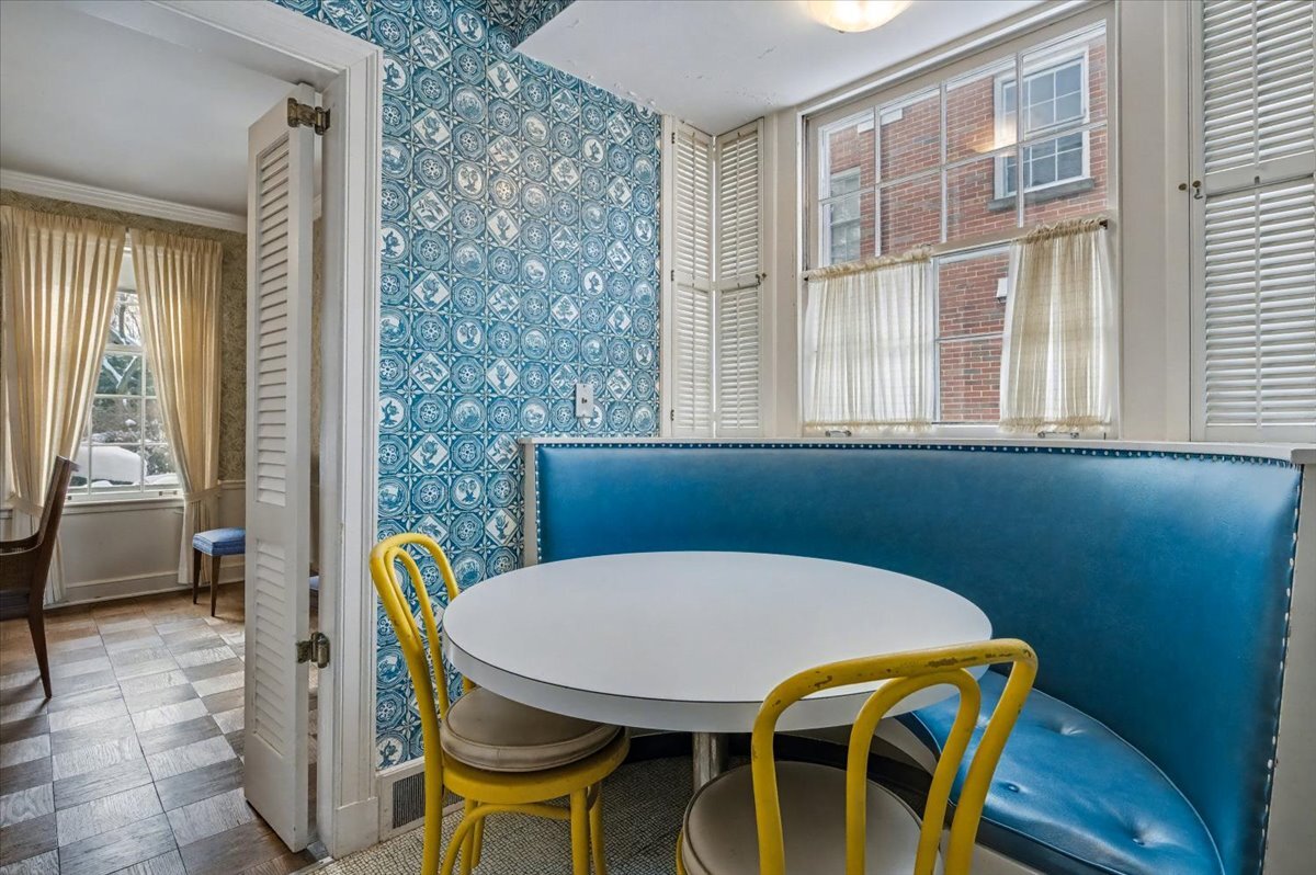 900 Sheridan Road Wilmette, IL 60091 - Photo 14 of 31 a view of a dining room with furniture window and outside view