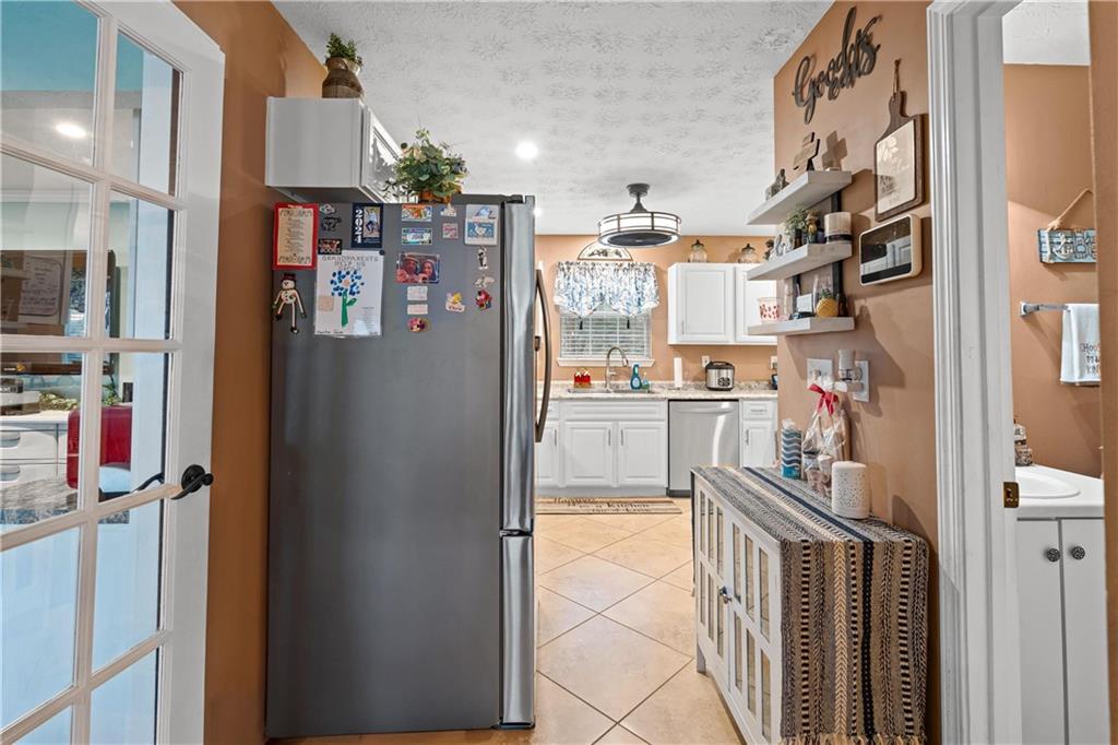 1380 Pebble Beach Lane Hampton, GA 30228 - Photo 22 of 59 a room with storage and utility