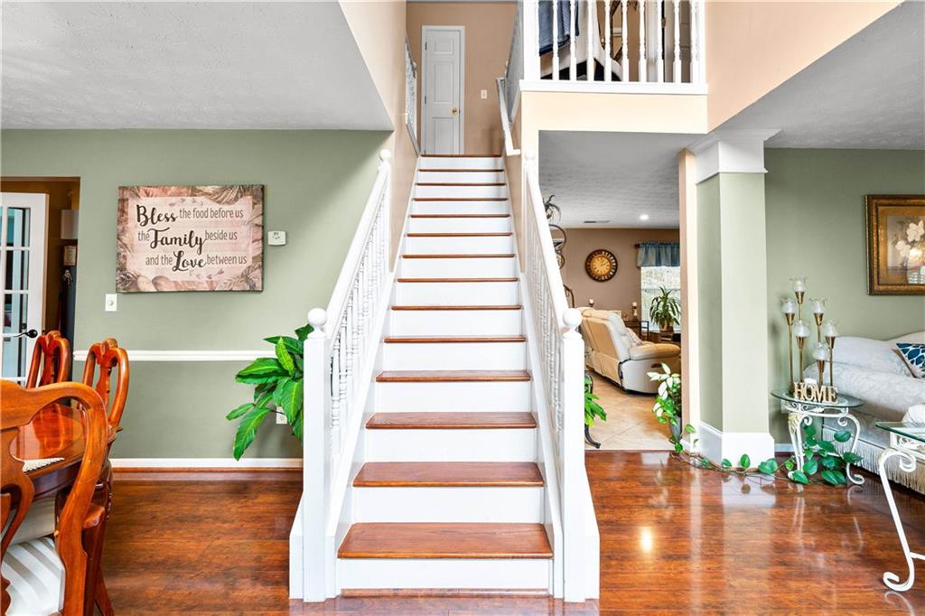 1380 Pebble Beach Lane Hampton, GA 30228 - Photo 30 of 59 a view of entryway with furniture and wooden floor