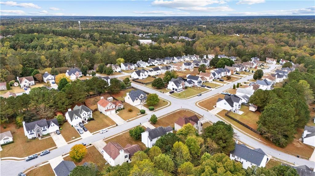1380 Pebble Beach Lane Hampton, GA 30228 - Photo 58 of 59 a view of a city with mountains in the background