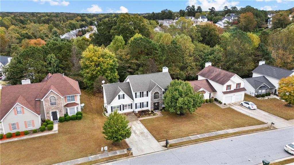 1380 Pebble Beach Lane Hampton, GA 30228 - Photo 59 of 59 an aerial view of residential houses with outdoor space and street view