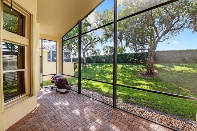 a view of a porch with a yard