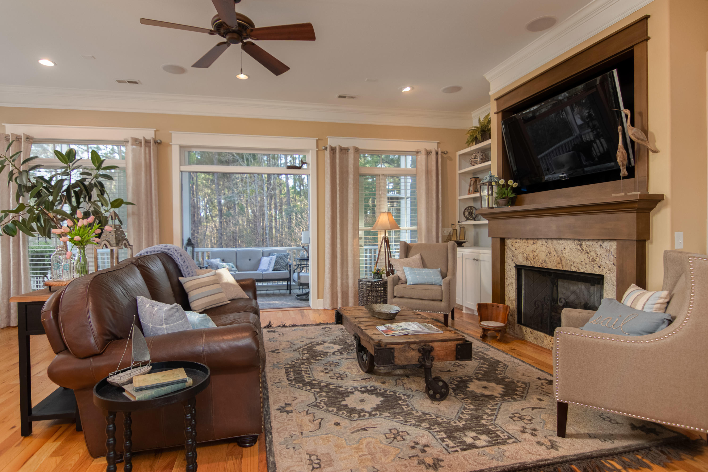 1180 Rivershore Road Charleston, SC 29492 - Photo 9 of 40 Living Room Open to Screen Porch
