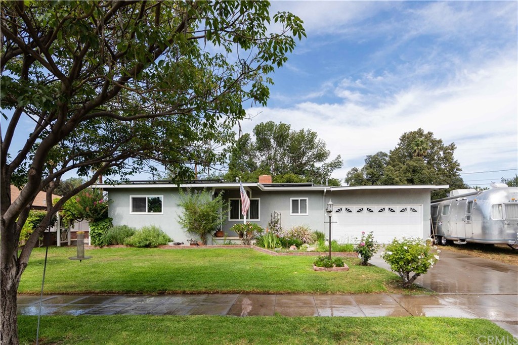 2881 Ronald Street Riverside, CA 92506 - Photo 1 of 1 a view of a house with backyard and garden