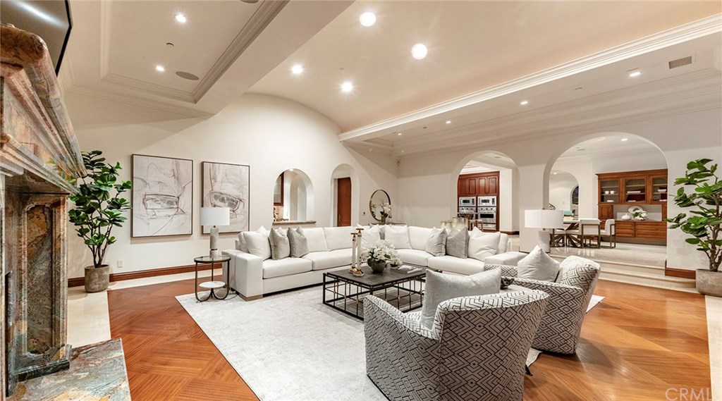32 Boulder View Irvine, CA 92603 - Photo 11 of 73 a living room with furniture lamp and a fireplace