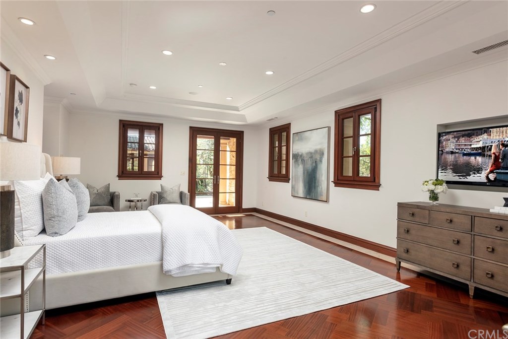 32 Boulder View Irvine, CA 92603 - Photo 22 of 73 a bedroom with a large bed and a dresser