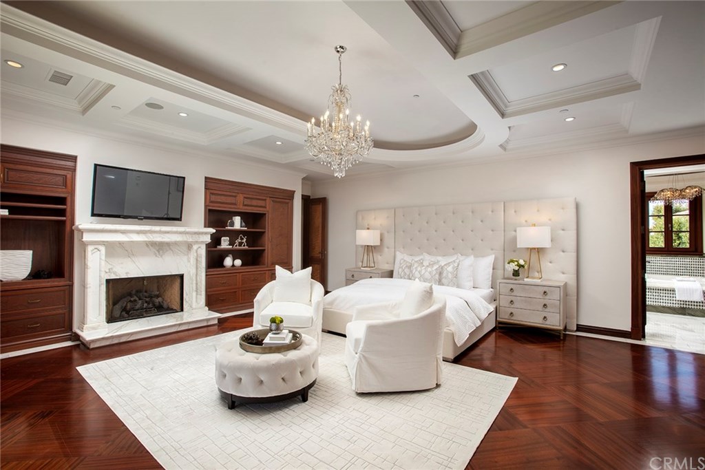 32 Boulder View Irvine, CA 92603 - Photo 26 of 73 a living room with furniture fireplace and flat screen tv