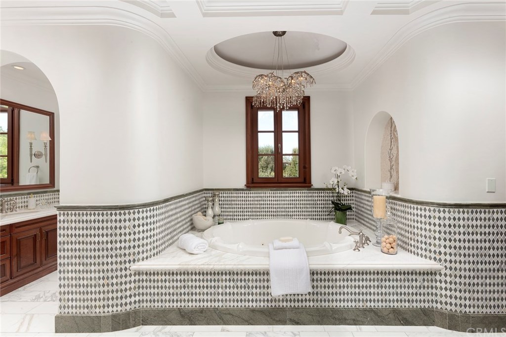 32 Boulder View Irvine, CA 92603 - Photo 29 of 73 a bathroom with a sink and a mirror