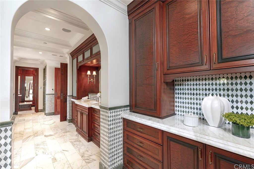 32 Boulder View Irvine, CA 92603 - Photo 34 of 73 a kitchen with granite countertop a sink stainless steel appliances and cabinets