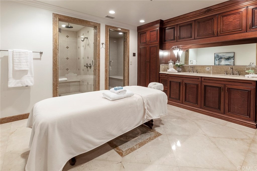 32 Boulder View Irvine, CA 92603 - Photo 48 of 73 a spacious bedroom with a bed and cabinets