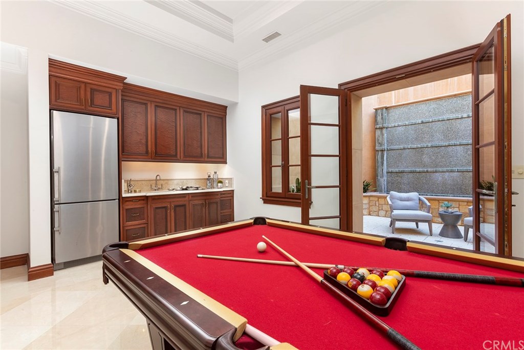 32 Boulder View Irvine, CA 92603 - Photo 50 of 73 a room with pool table and windows