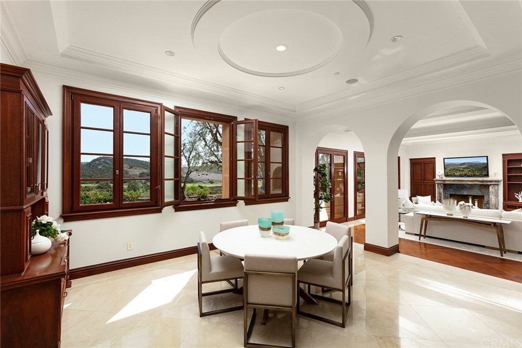 32 Boulder View Irvine, CA 92603 - Photo 8 of 73 a view of a dining room with furniture window and outside view