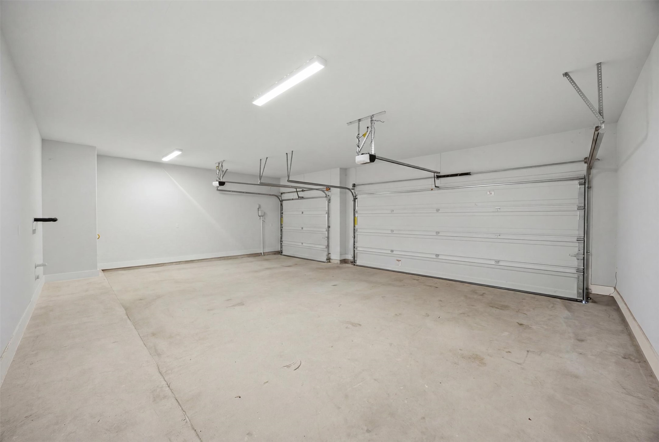 2101 Little Snake Way Georgetown, TX 78633 - Photo 37 of 37 Secure parking is readily available in this generously proportioned garage with multiple doors.