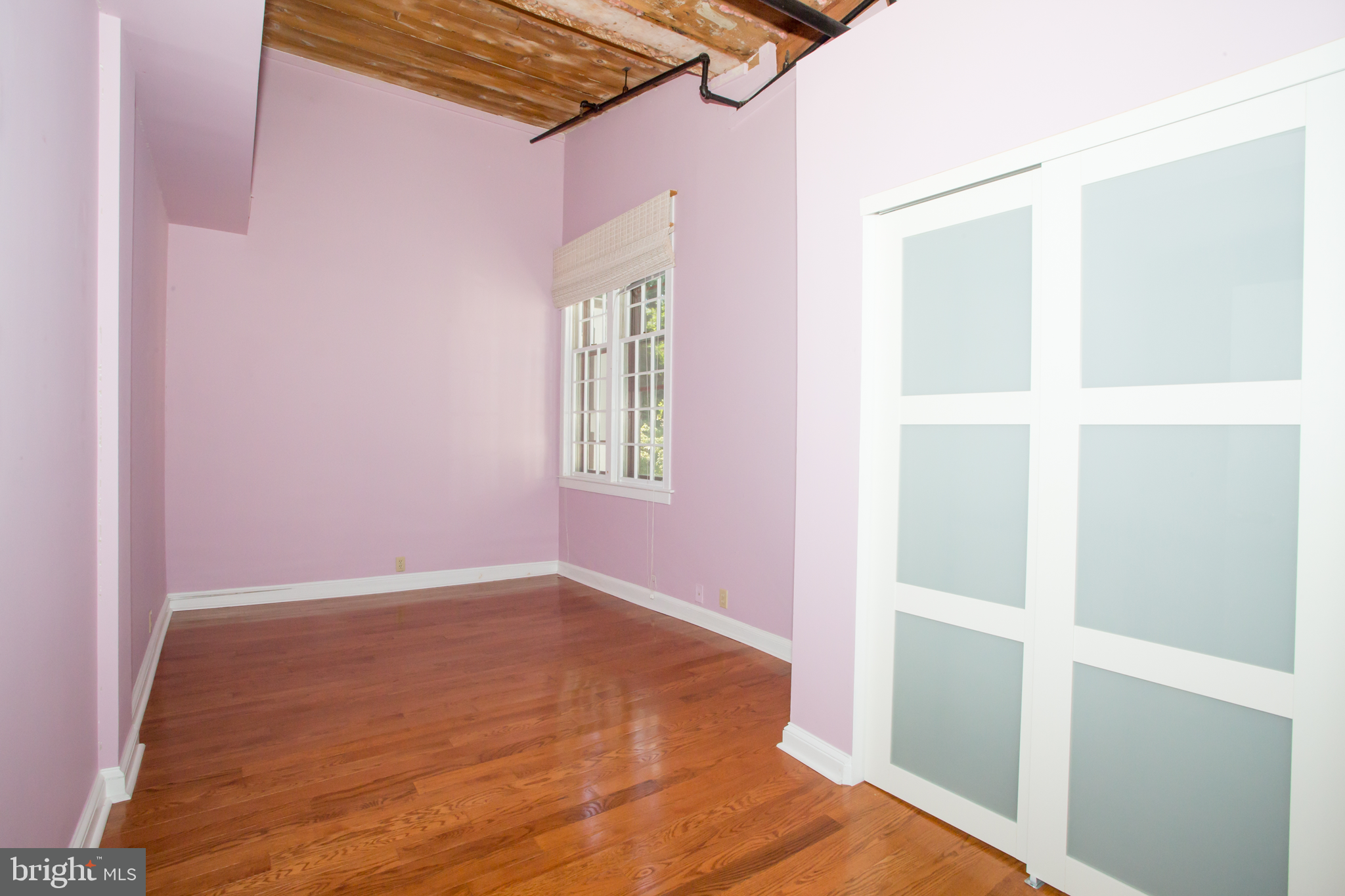 49 Bancroft Mills Road, Unit P9 Wilmington, DE 19806 - Photo 19 of 23 Upper-Level bedroom w/ sliding doors to closet