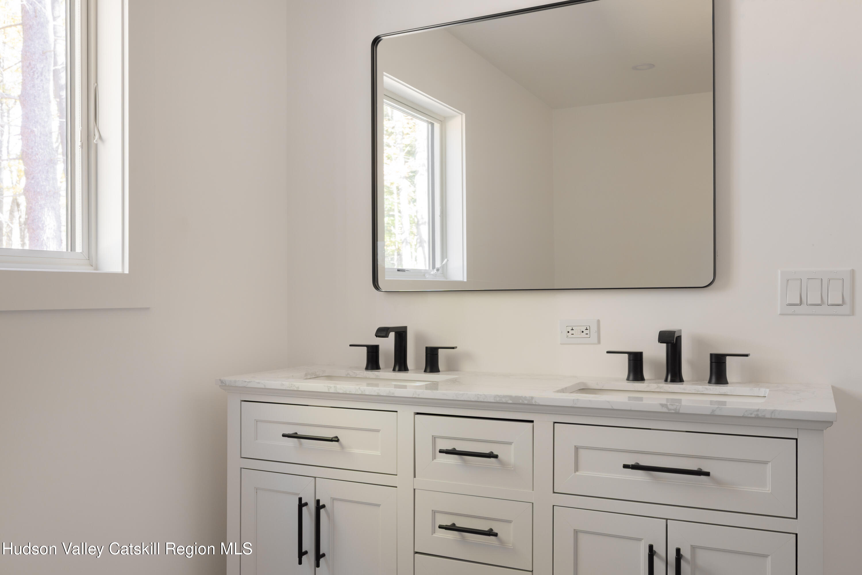 246 South Road Ruby, NY 12475 - Photo 16 of 35 a bathroom with a sink and a mirror