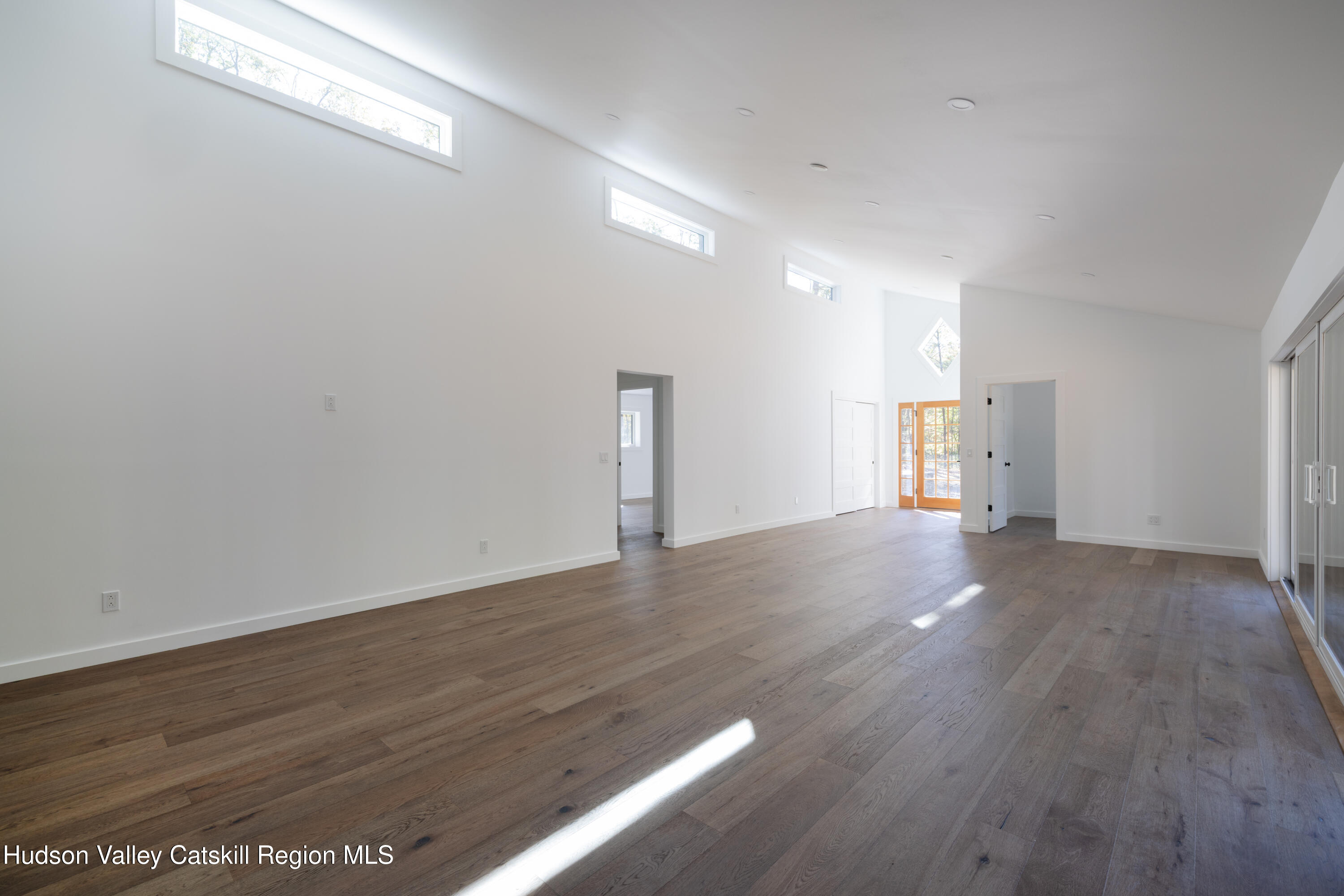 246 South Road Ruby, NY 12475 - Photo 17 of 35 a view of empty room with wooden floor
