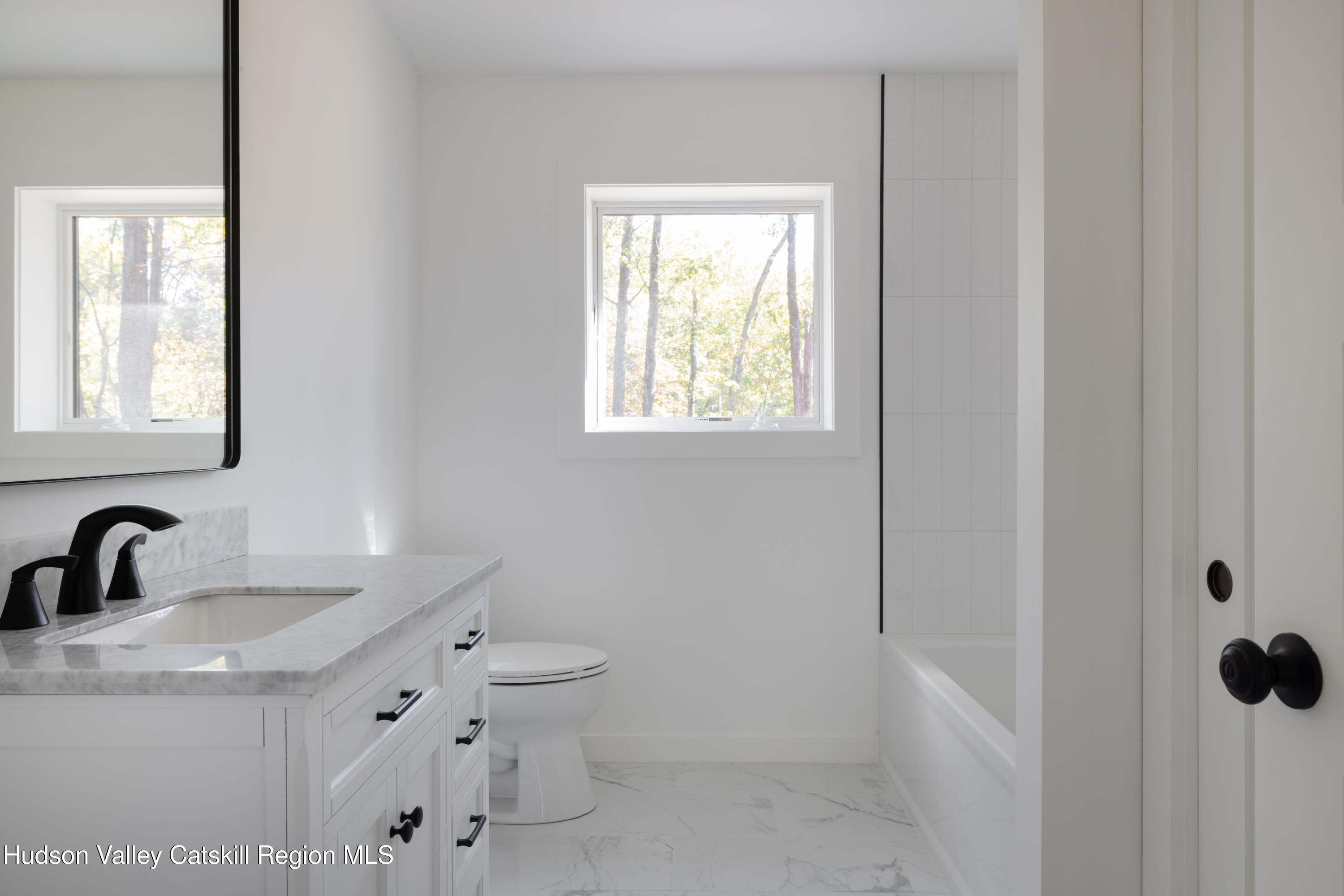 246 South Road Ruby, NY 12475 - Photo 20 of 35 a bathroom with a sink toilet and shower