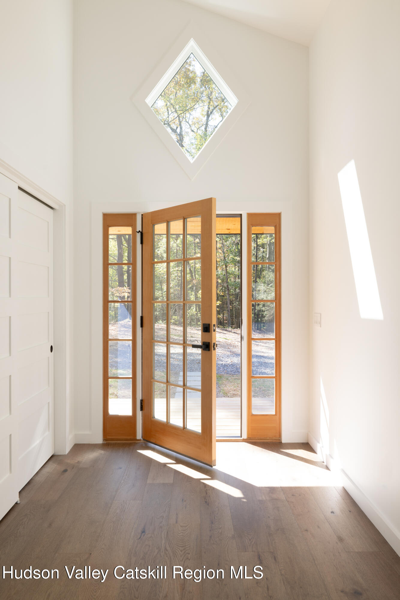 246 South Road Ruby, NY 12475 - Photo 8 of 35 a view of an empty room with a window