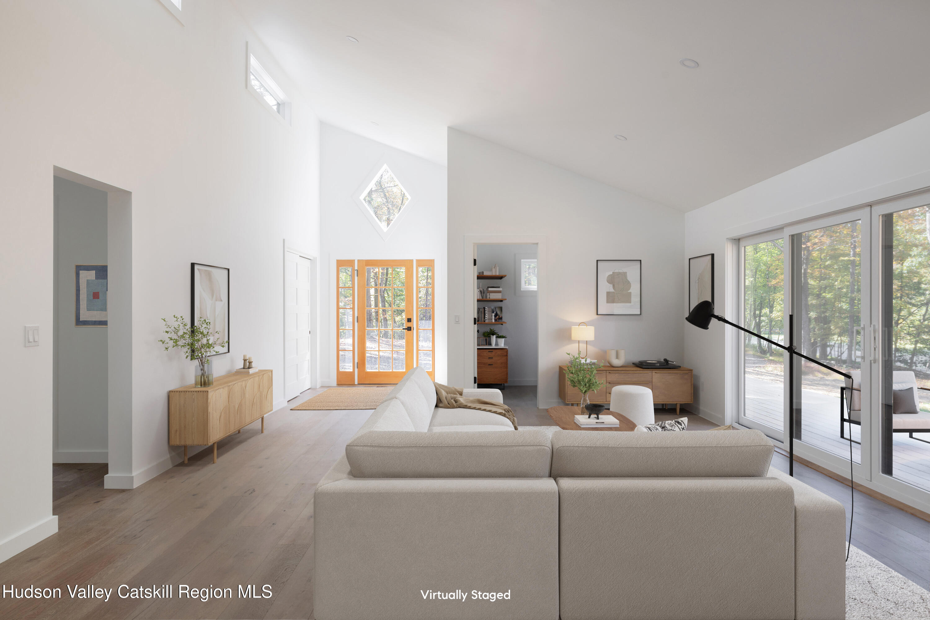 246 South Road Ruby, NY 12475 - Photo 9 of 35 a living room with furniture and a large window