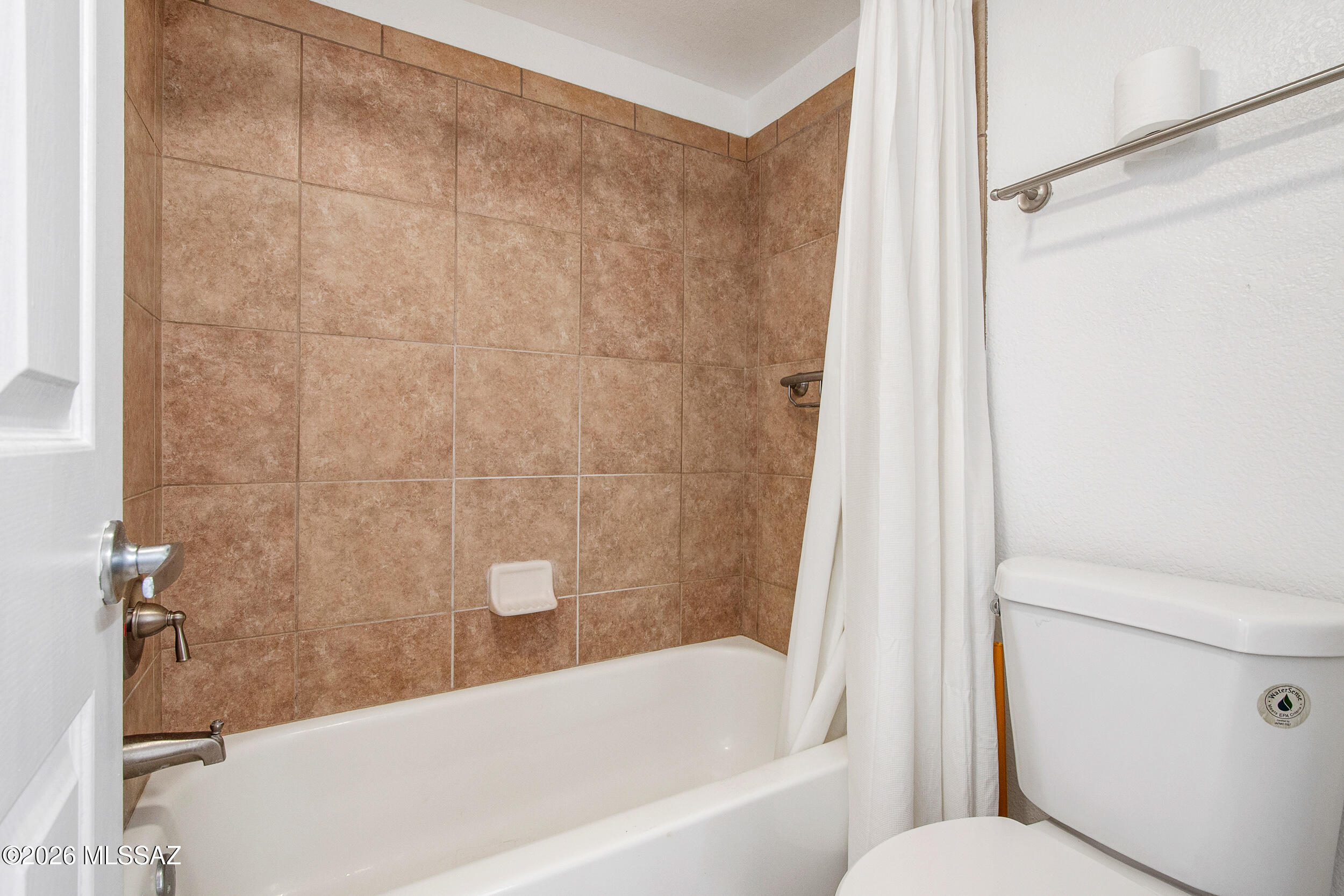 5855 North Kolb Road, Unit 6103 Tucson, AZ 85750 - Photo 12 of 31 a bathroom with a bathtub and a shower