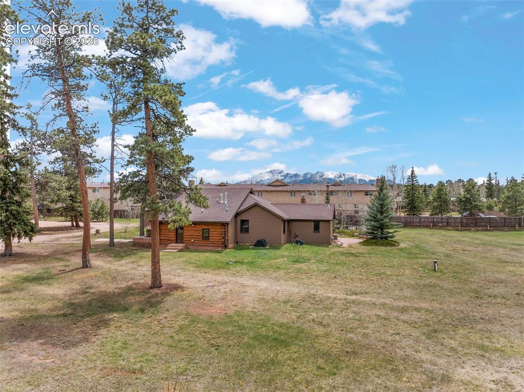 1100 Rampart Range Road Woodland Park, CO 80863 - Photo 4 of 50 3.74 acre lot features breathtaking Pikes Peak views
