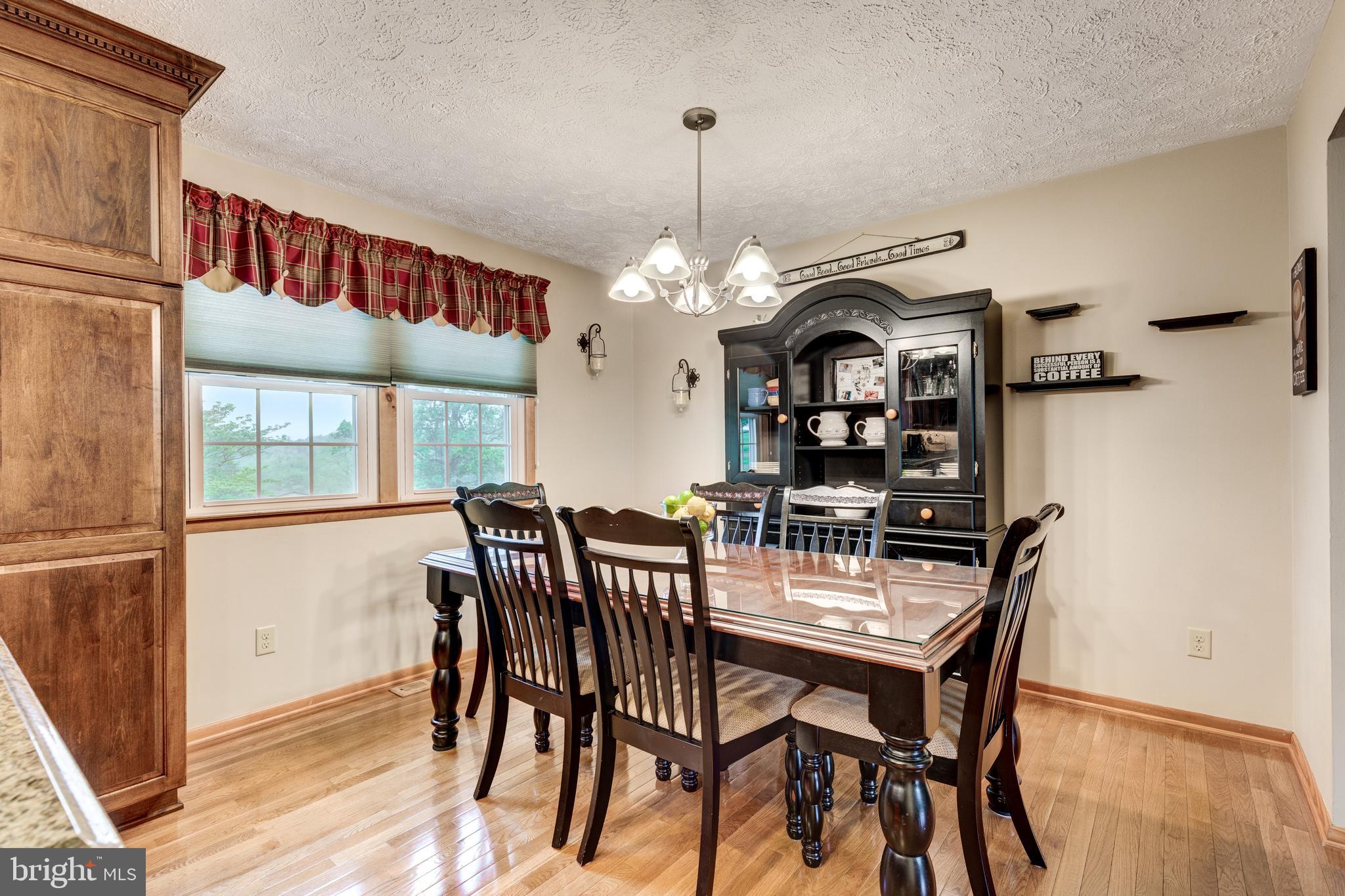 1640 Stone Chapel Road New Windsor, MD 21776 - Photo 21 of 48 Hardwoods all throughout the kitchen
