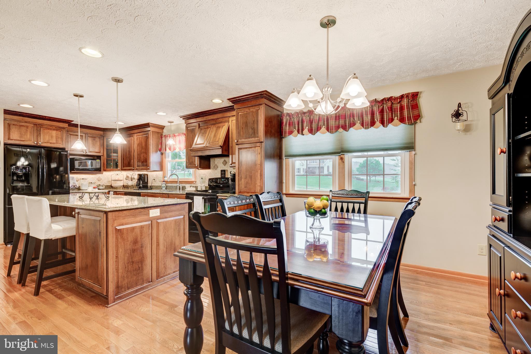 1640 Stone Chapel Road New Windsor, MD 21776 - Photo 22 of 48 Sleek black appliances