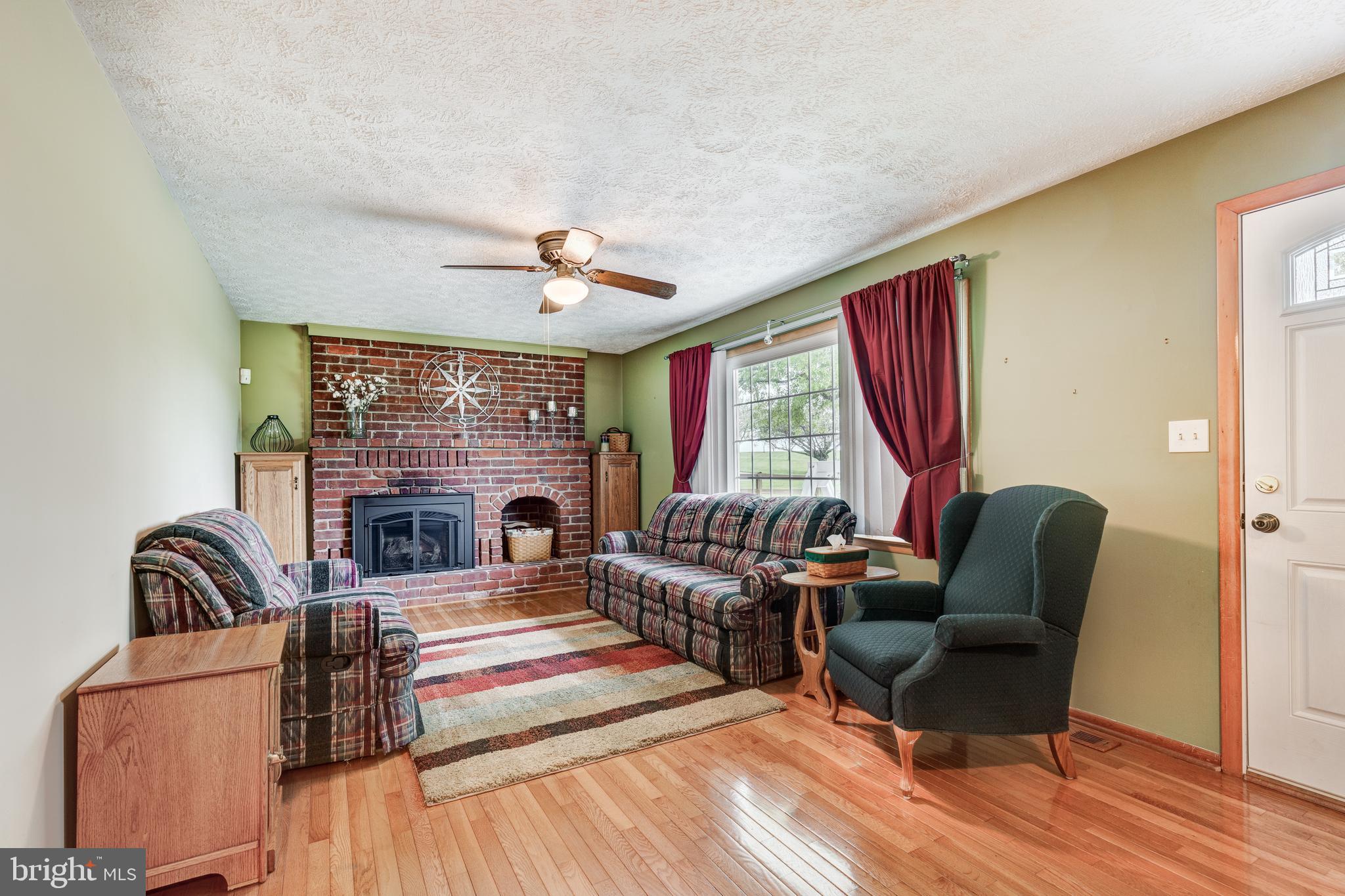 1640 Stone Chapel Road New Windsor, MD 21776 - Photo 24 of 48 Gas fireplace in living room- so cozy!