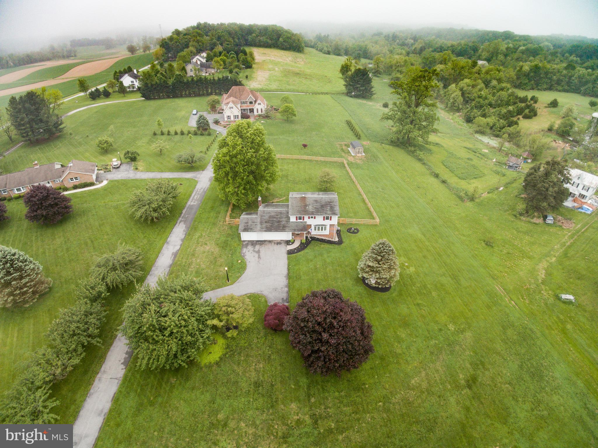 1640 Stone Chapel Road New Windsor, MD 21776 - Photo 7 of 48 Surrounded by lush greenery