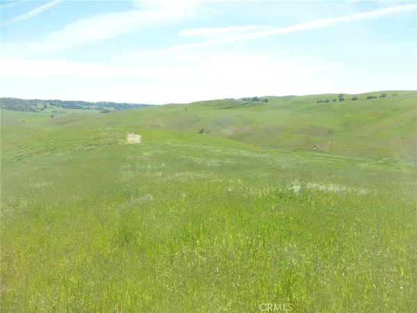 a view of ocean and mountain