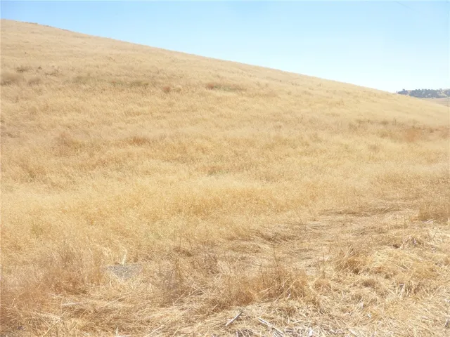 a view of beach and an ocean