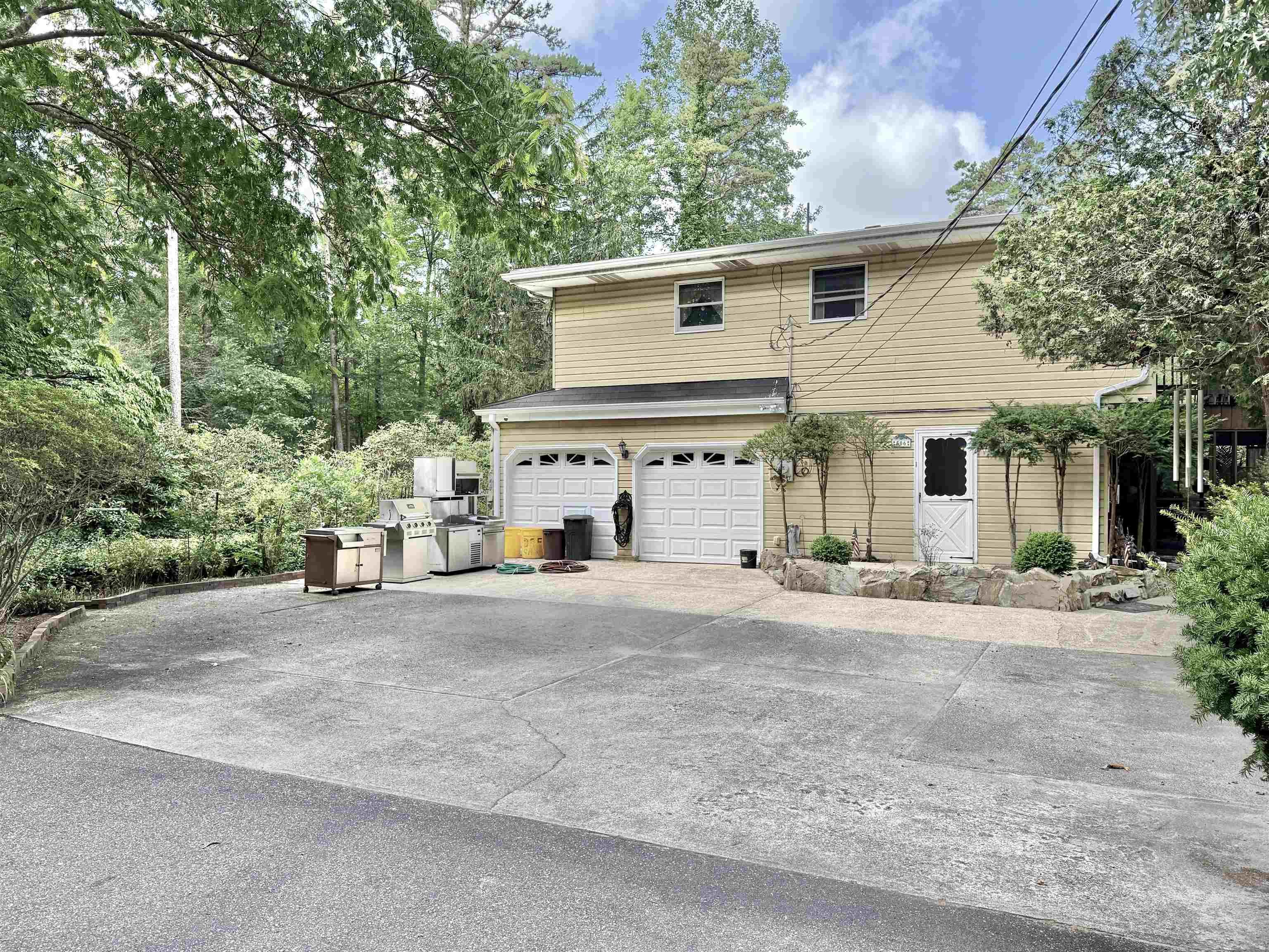 506 Hagen Road South Dennis, NJ 08210 - Photo 12 of 49 a view of a white house with a road and plants