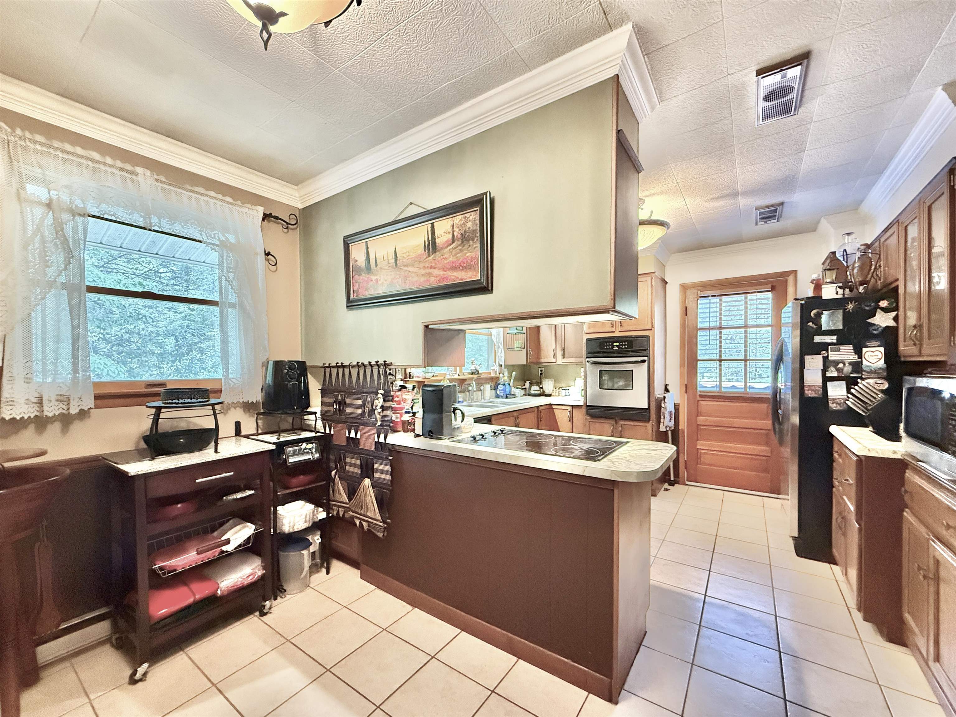 506 Hagen Road South Dennis, NJ 08210 - Photo 22 of 49 a kitchen with stainless steel appliances granite countertop sink stove top oven and cabinets