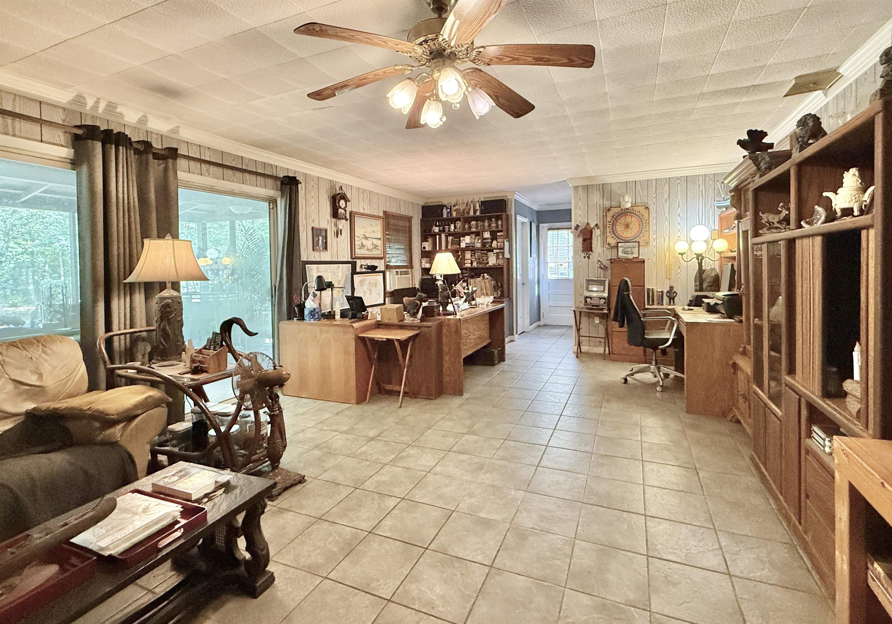 506 Hagen Road South Dennis, NJ 08210 - Photo 29 of 46 a living room with furniture a chandelier and a dining table