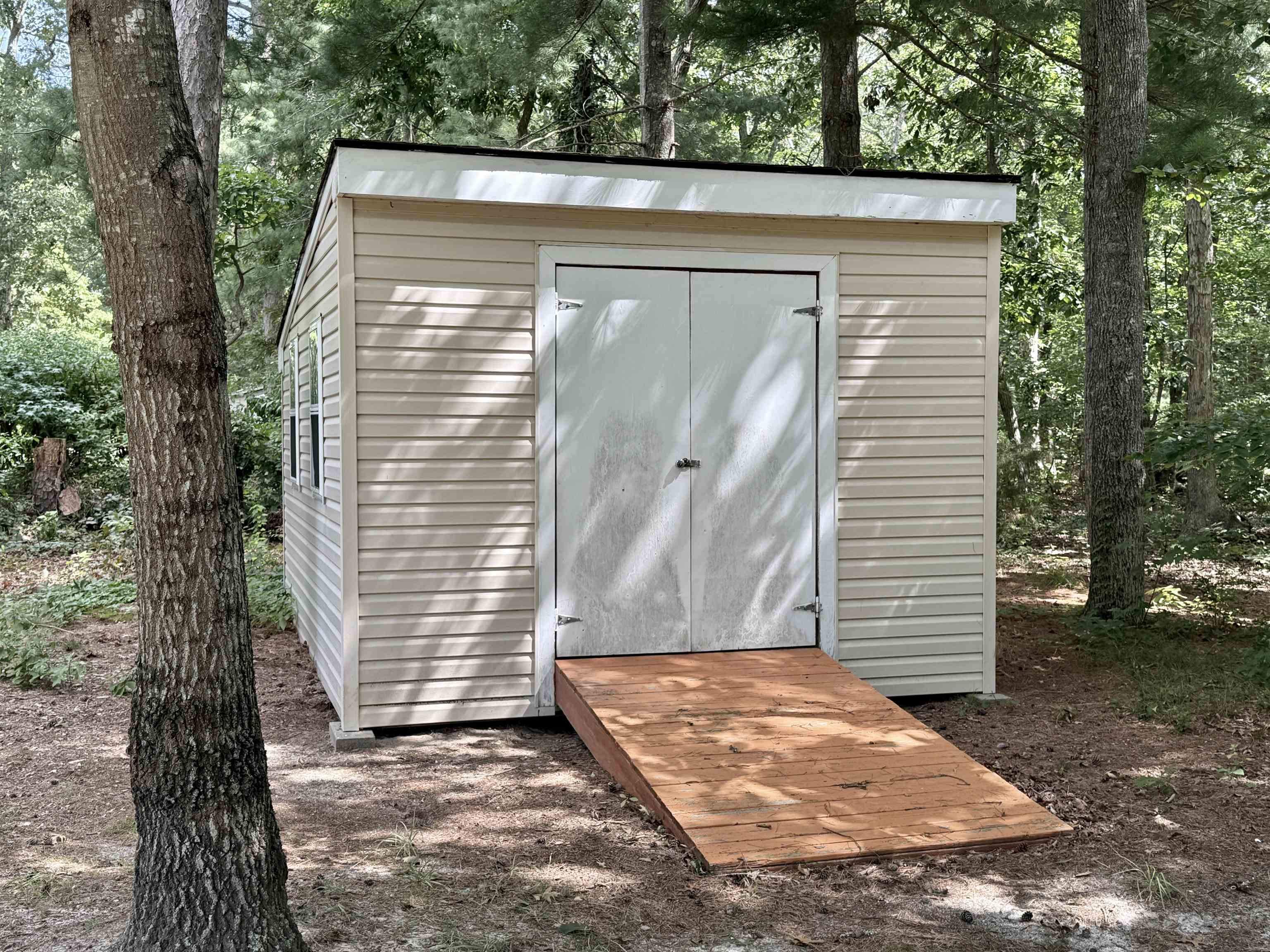 506 Hagen Road South Dennis, NJ 08210 - Photo 41 of 49 a view of a house with a small yard