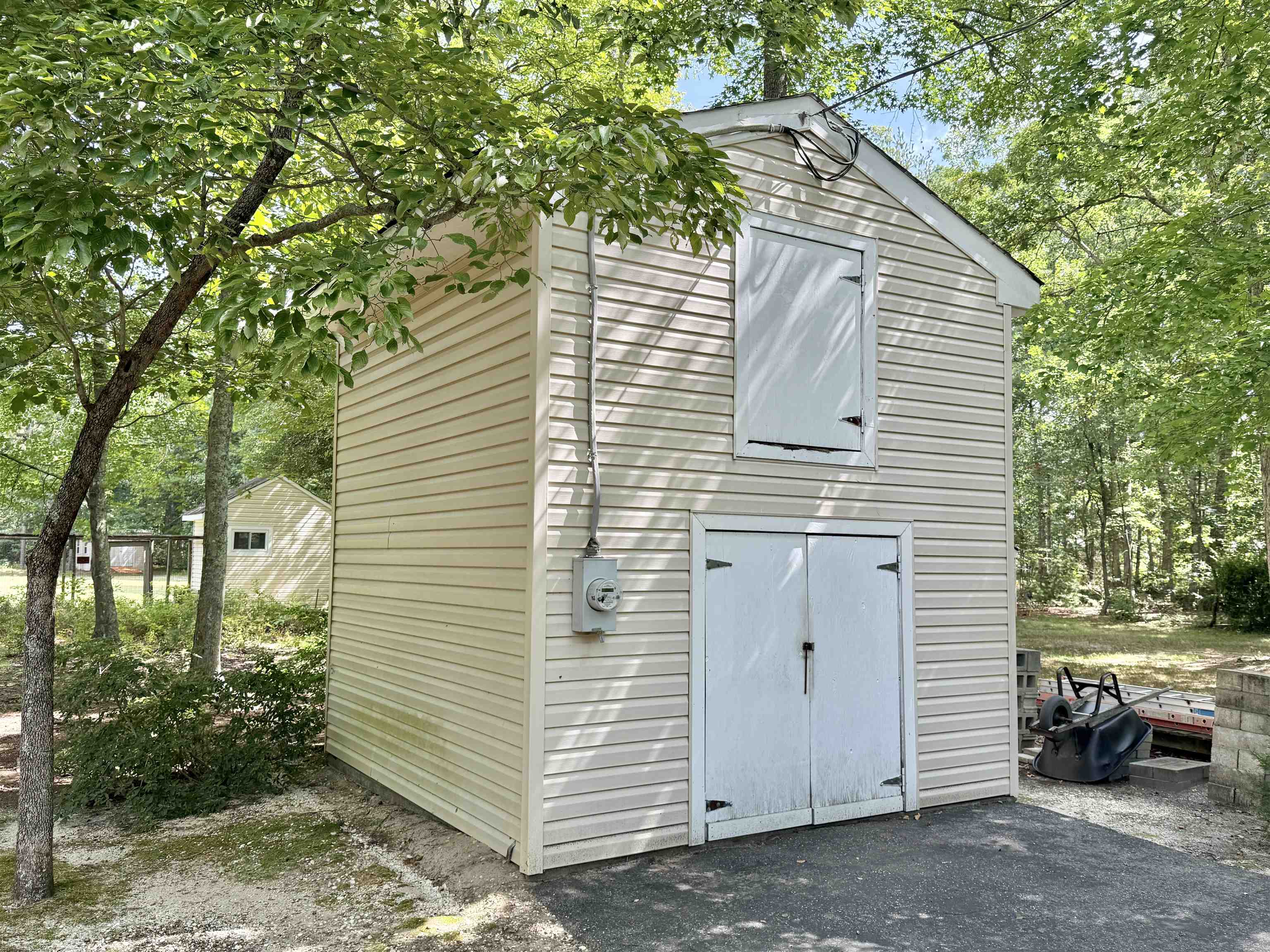 506 Hagen Road South Dennis, NJ 08210 - Photo 5 of 46 a view of a house with a small yard and large tree